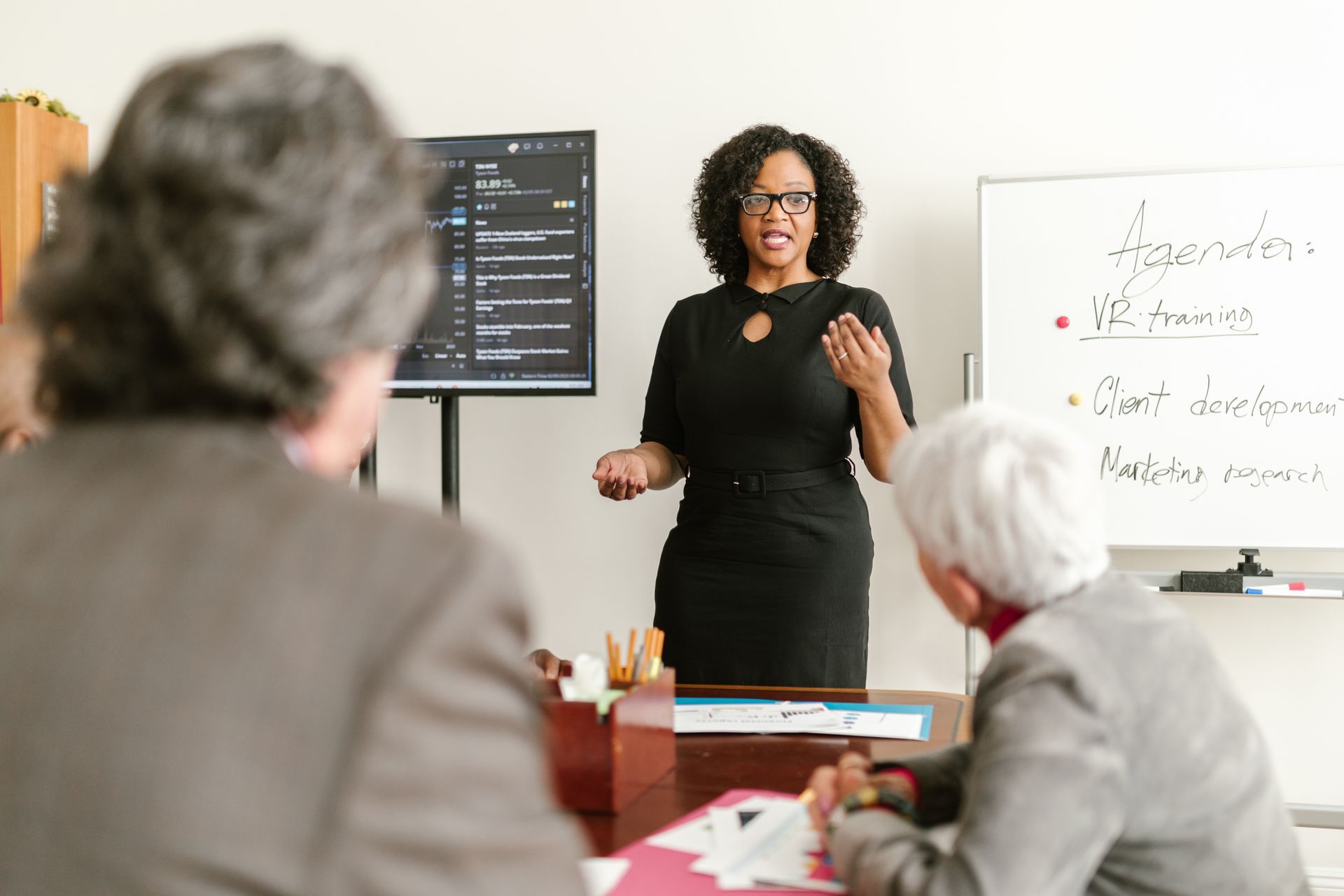 A facilitator leading a professional training session